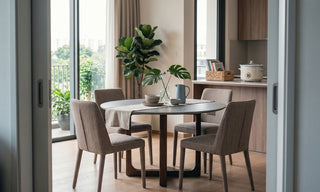 Slow cooker on a compact Singapore kitchen counter beside a dining area with plants and natural light