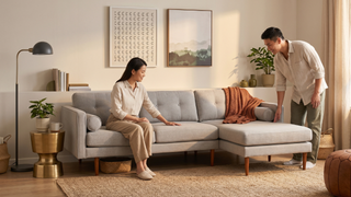 Modern sofa in a Singapore living room with clean layout and warm home styling