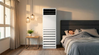 Woman sleeping beside a standing air con in a cosy Singapore bedroom