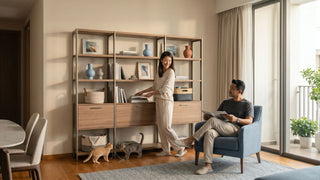 Stylish storage racks combining open shelves and closed storage solutions in a modern Singapore apartment living room.