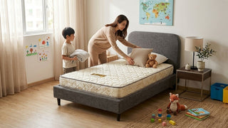 Mother styling a twin bed mattress with a child in a bright Singapore kids’ room