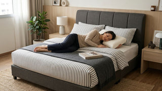 Woman sleeping on a small pillow in a modern Singapore bedroom
