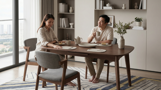 Wooden dining table in a Singapore dining room with warm modern home styling