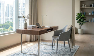Compact wooden study table with grey chair in a small Singapore home workspace