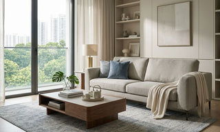 Zolano fabric sofa in a modern Singapore HDB living room with neutral decor, coffee table, shelves, and large window view.