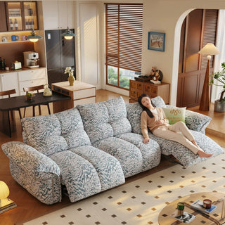 Two-tone fabric power recliner sofa in a living room