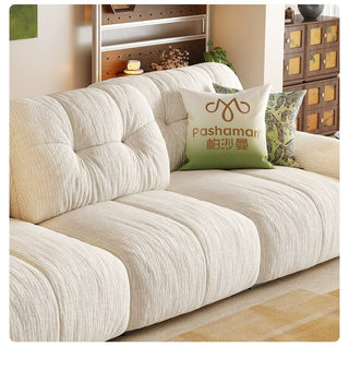 Plump, tufted cushions