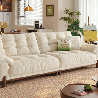 Cream chenille cloud sofa in a living room
