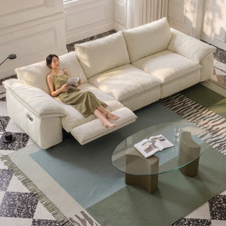 Cream fabric power sofa in a living room