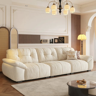 Cream ripple-chenille cloud sofa in a living room