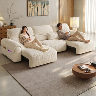 Cream power sofa bed in a living room
