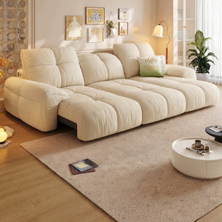 Cream chenille power sofa bed in a living room