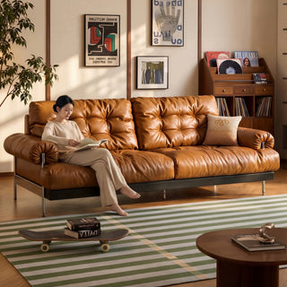 Tan leather sofa in a living room