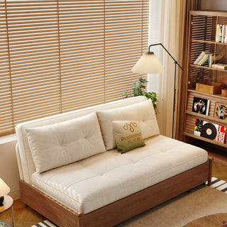 Cream cat-scratch sofa bed in a rubberwood frame