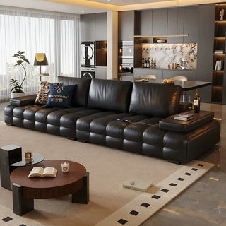 Black leather sofa in a living room