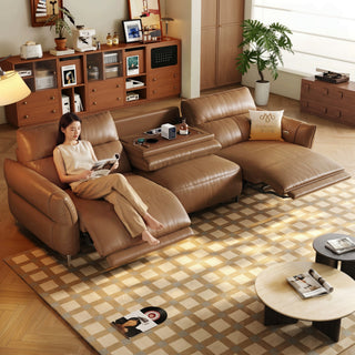 Tan leather power sofa with flip-down table in a living room