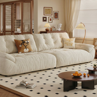 Cream fabric sofa in a living room