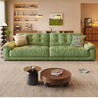 Matcha-green cat-scratch cloud sofa in a living room