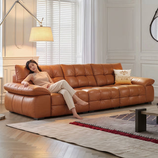 Tan leather sofa in a living room