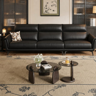 Black leather sofa in a living room