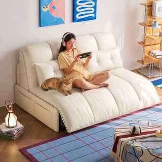 Cream leather sofa bed in a living room