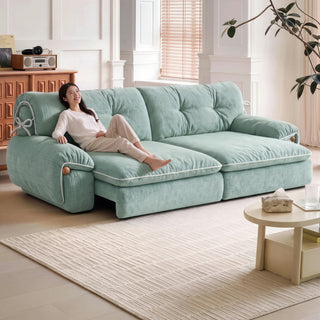 Green fabric sofa bed in a living room