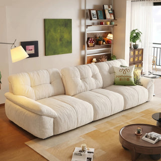 Cream chenille cloud sofa in a living room