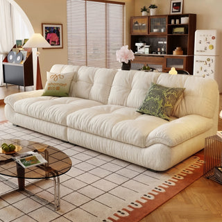 Cream chenille cloud sofa in a living room