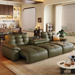Olive leather power sofa in a living room