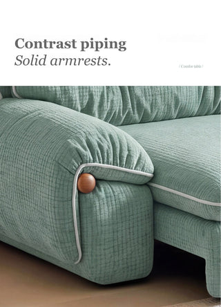 Contrast piping and solid armrests