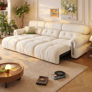 Cream chenille power sofa bed in a living room