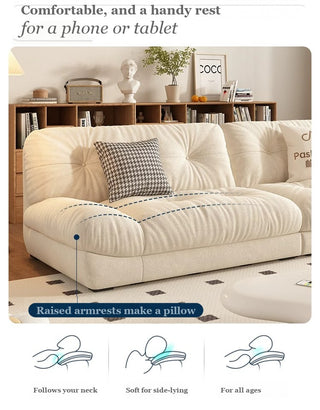 Raised armrests double as pillows