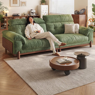 Fabric sofa with solid wood side panels in a living room