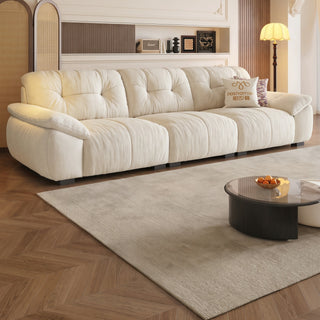 Cream fabric sofa in a living room