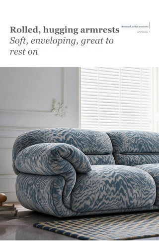 Rolled, hugging armrests