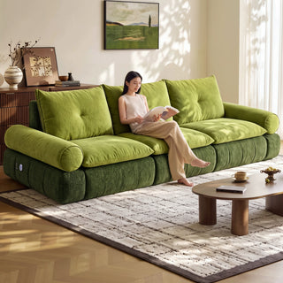 Green fabric sofa bed in a living room