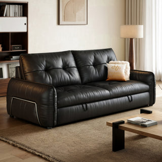 Black leather sofa bed in a living room