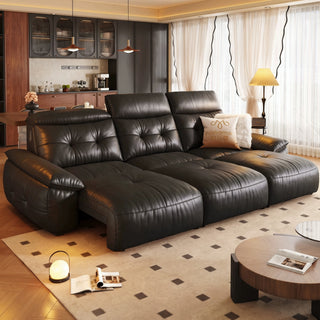Black leather power sofa bed in a living room