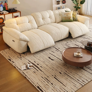 Cream ripple-chenille power recliner sofa in a living room