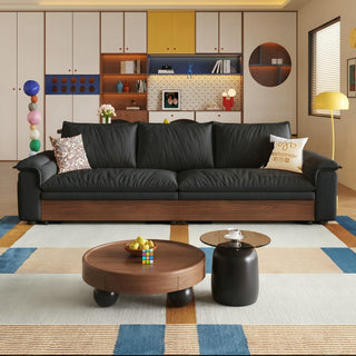 Black air-cloud velvet storage sofa bed in a living room