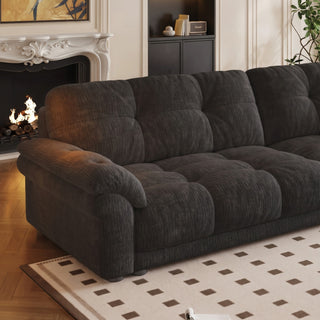 Black chenille cloud sofa in a living room