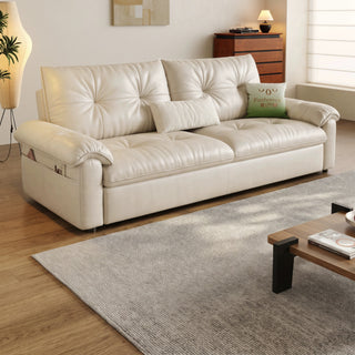 Cream leather sofa bed in a living room