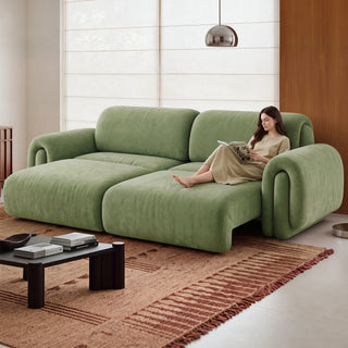 Power reclining fabric sofa in a living room