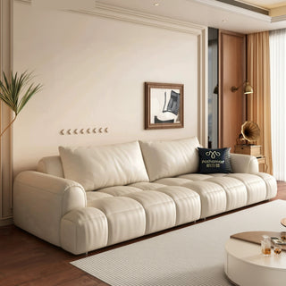 Cream leather puff sofa in a living room
