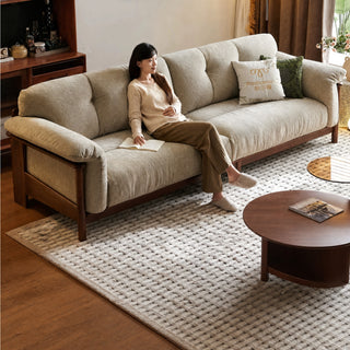 Taupe chenille sofa in a solid wood frame