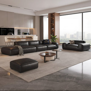 Black leather low modular sofa in a living room