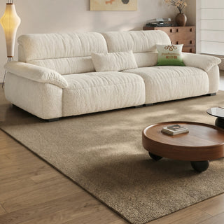 Cream lamb-fleece sofa in a living room