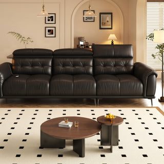 Black leather sofa in a living room