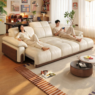 Cream leather power sofa bed in a living room