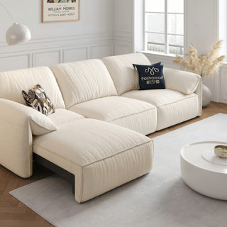 Cream cat-scratch fabric power sofa bed in a living room